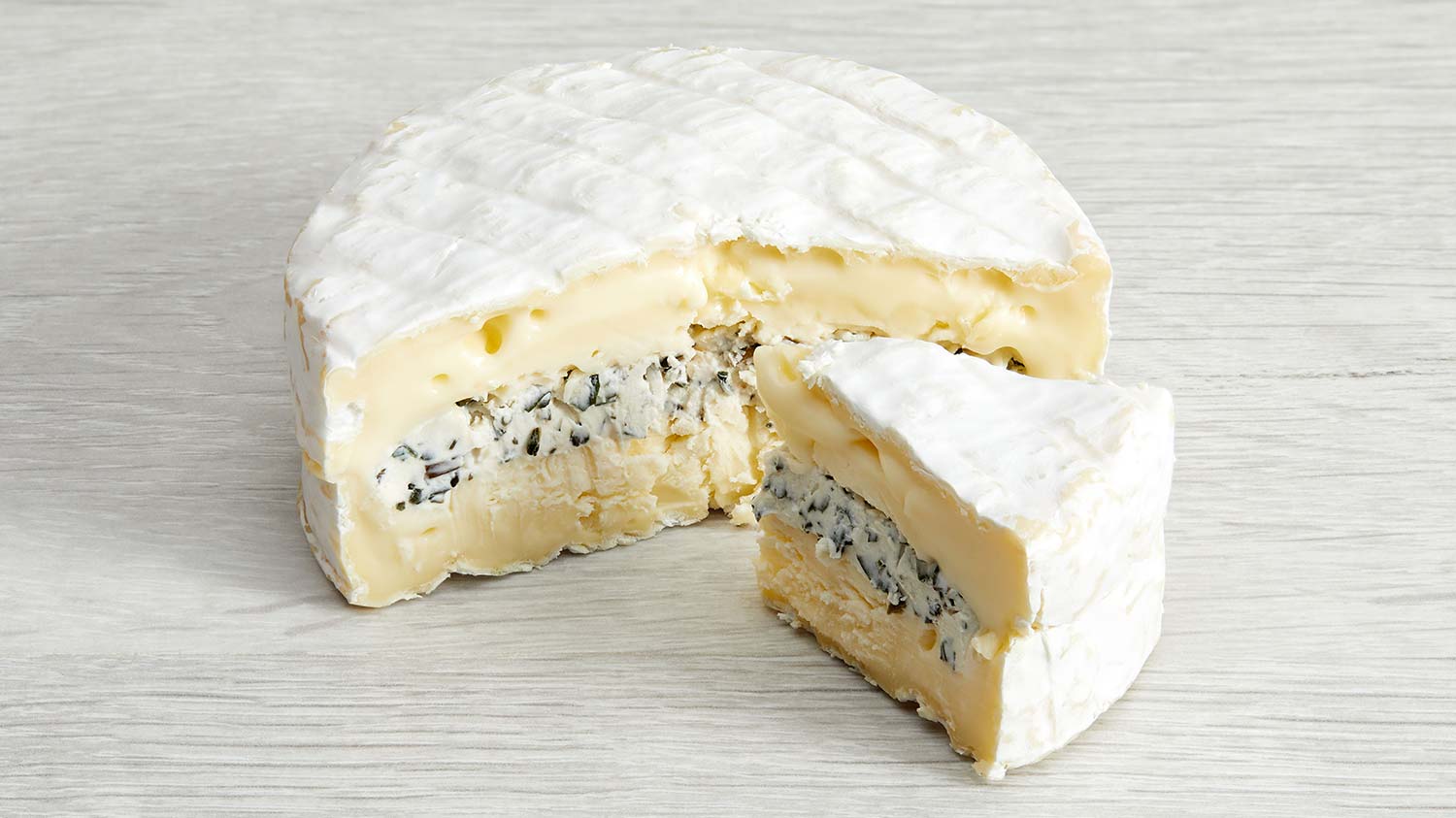 Cheeses_in_Season_Small_Petit_Camembert_Basilic_Cow_Cheese_with_Basil_Wild_Garlic_from_France_Seasonal_French_Cheese_in_Dubai_Abu_Dhabi_WISK_UAE.jpg